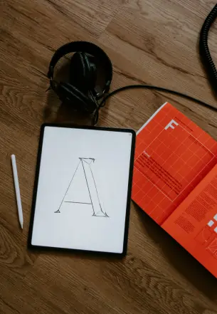 The letter A being drawn on an ipad